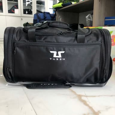 Large travel bag processing