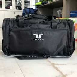Large travel bag processing